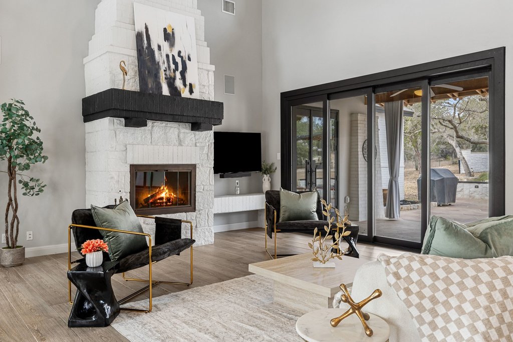 4018 Bee Creek Road Spicewood, TX 78669 - Photo 18 of 40 Another view of the living room with seamless indoor/outdoor flow.