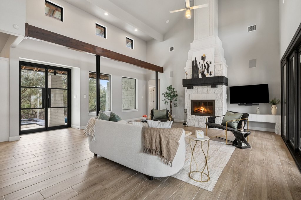 4018 Bee Creek Road Spicewood, TX 78669 - Photo 19 of 40 Living room featuring Cantera steel doors.