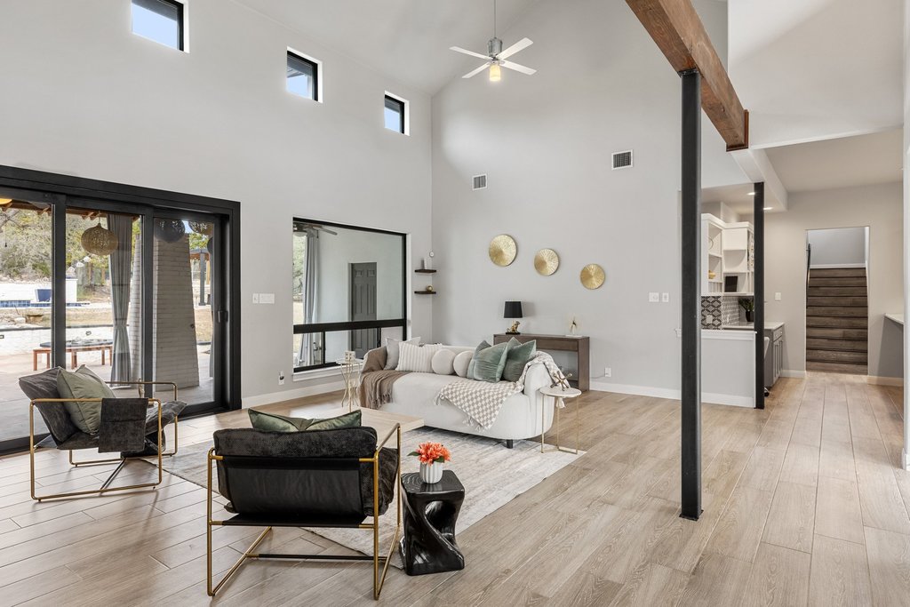4018 Bee Creek Road Spicewood, TX 78669 - Photo 20 of 40 Open concept living with high ceilings and beautiful natural light.