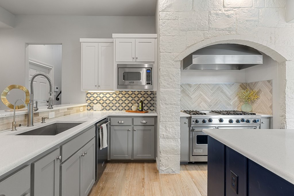 4018 Bee Creek Road Spicewood, TX 78669 - Photo 24 of 40 Kitchen designed for both everyday living and hosting.