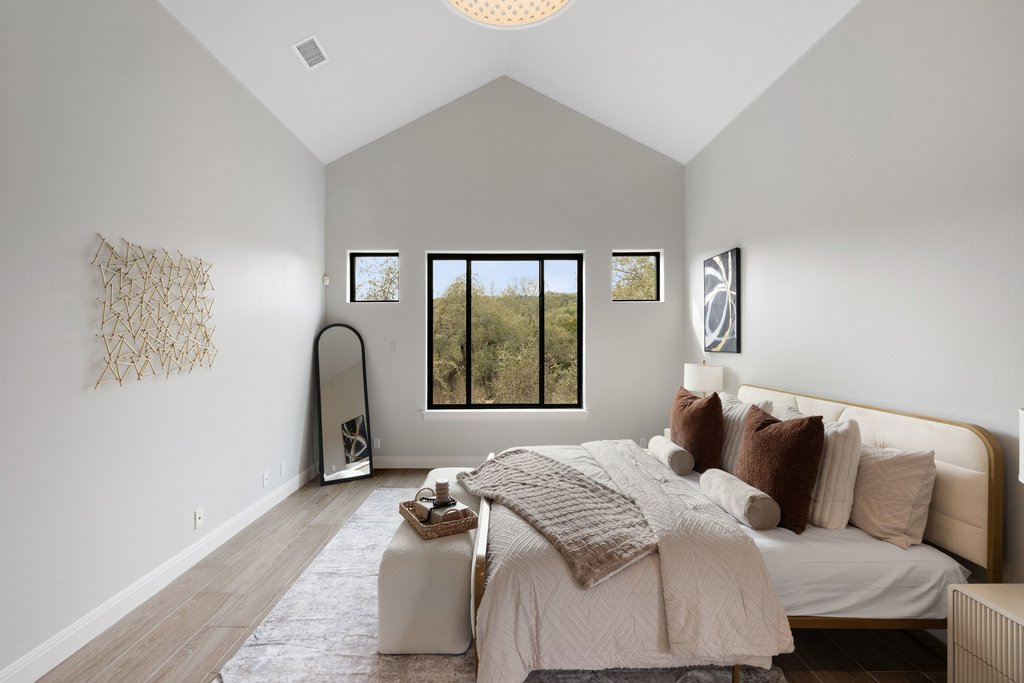 4018 Bee Creek Road Spicewood, TX 78669 - Photo 30 of 40 Serene primary bedroom.