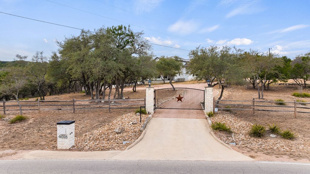 4018 Bee Creek Road Spicewood, TX 78669 - Photo 4 of 40 Gated entry offering privacy and security.