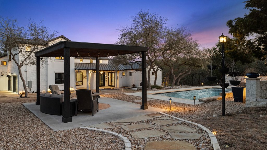 4018 Bee Creek Road Spicewood, TX 78669 - Photo 7 of 40 Resort style outdoor living with cabana, pool, garden and multiple entertaining spaces.