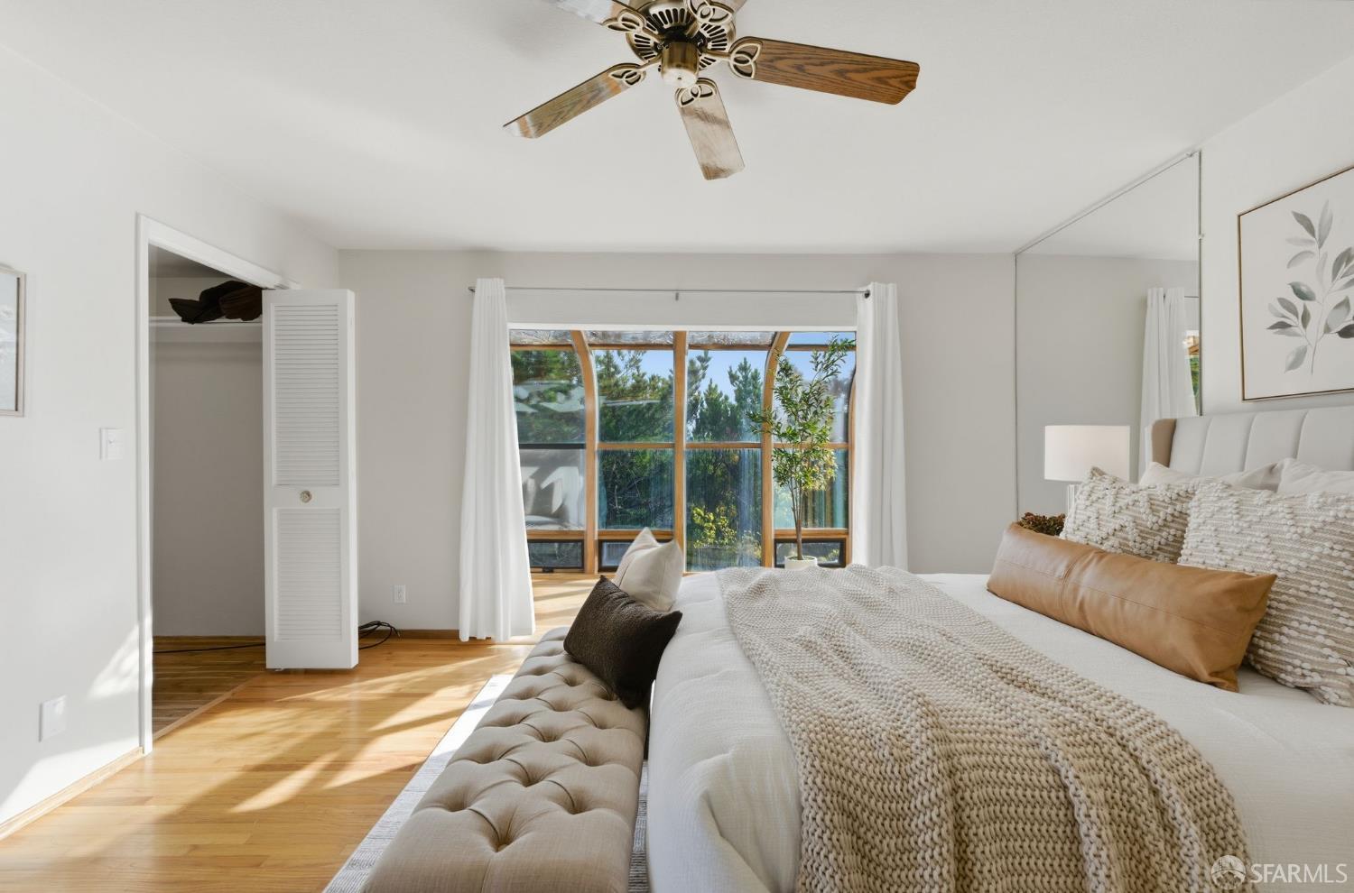 969 Springfield Drive Millbrae, CA 94030 - Photo 24 of 48 a bedroom with a large bed and a window