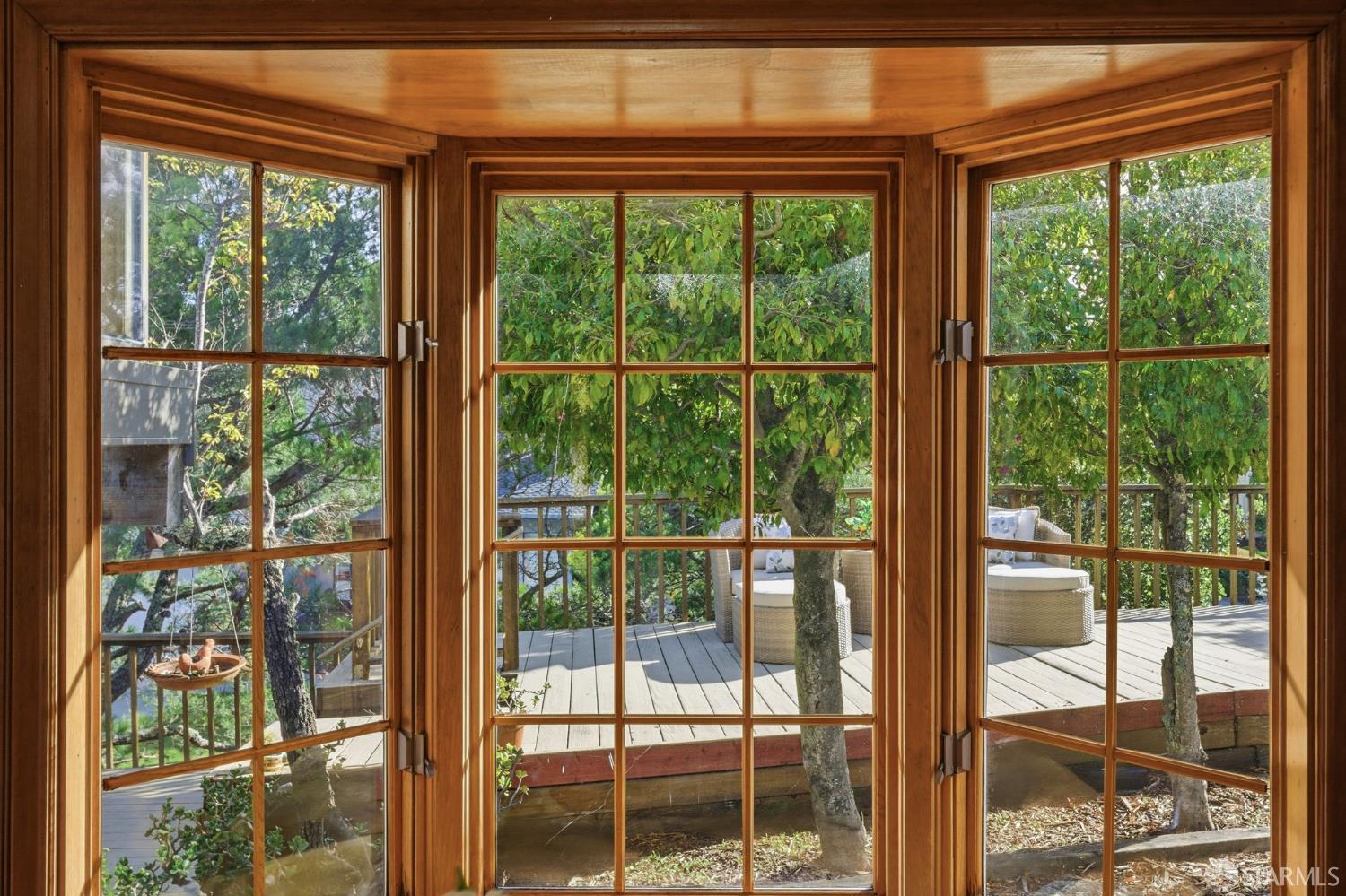 969 Springfield Drive Millbrae, CA 94030 - Photo 35 of 48 a view of a room and trees from a outdoor space