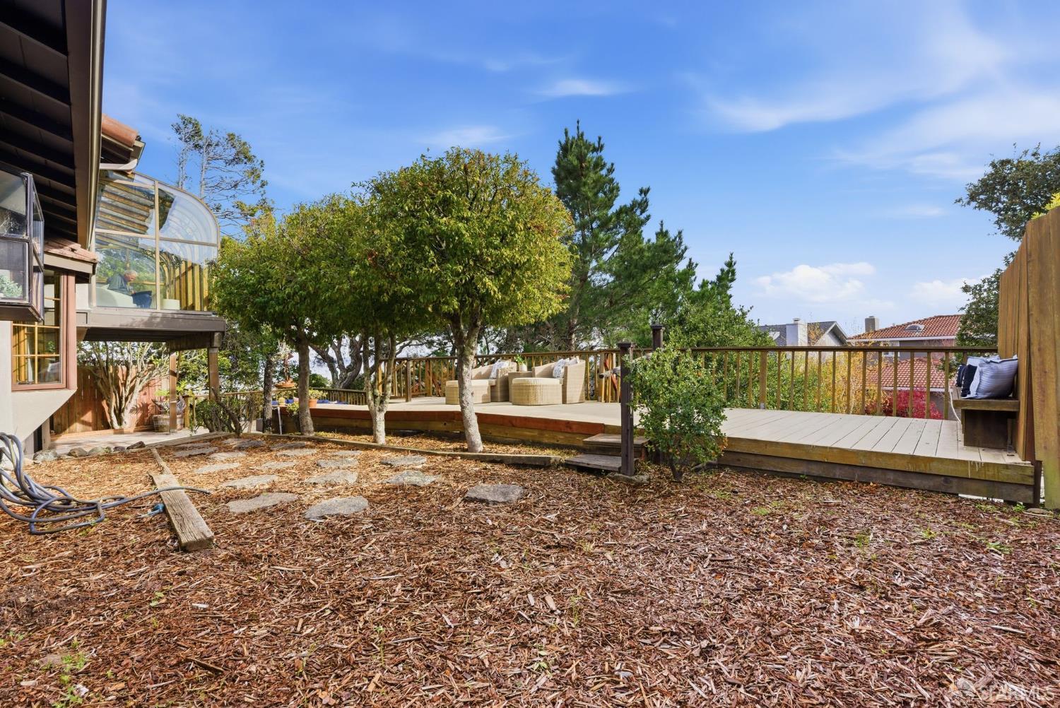 969 Springfield Drive Millbrae, CA 94030 - Photo 43 of 48 a view of a bench in a backyard