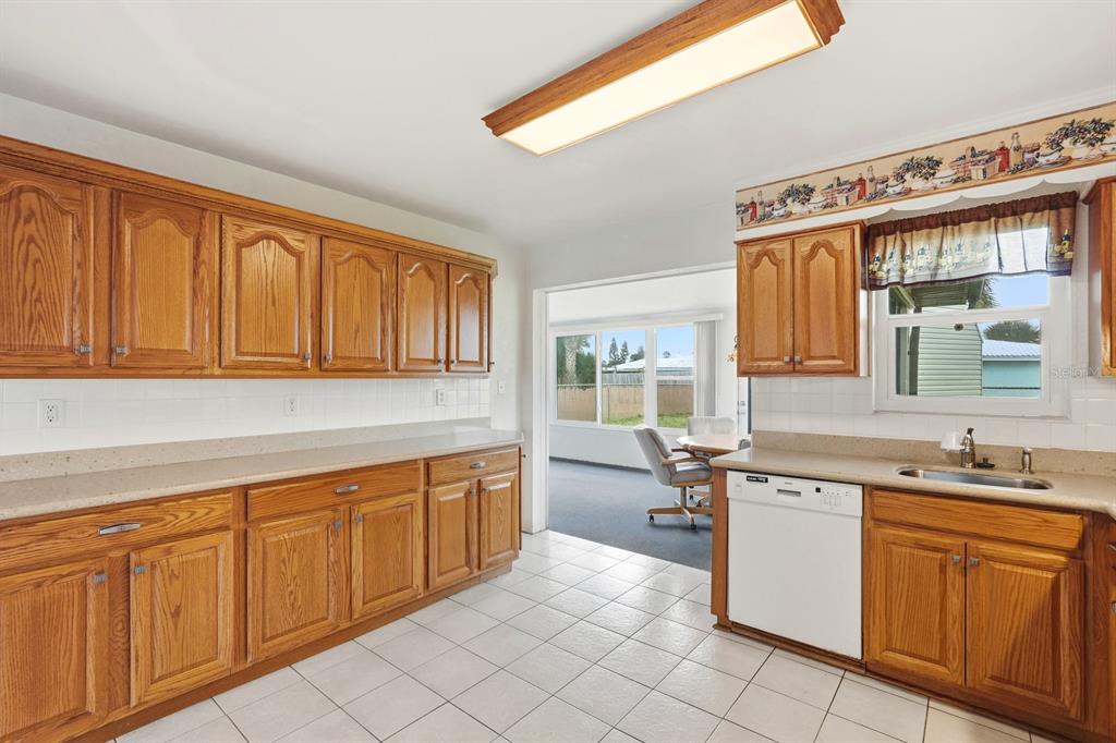 37 Berkley Road Ormond Beach, FL 32176 - Photo 15 of 41 a kitchen with a sink and cabinets