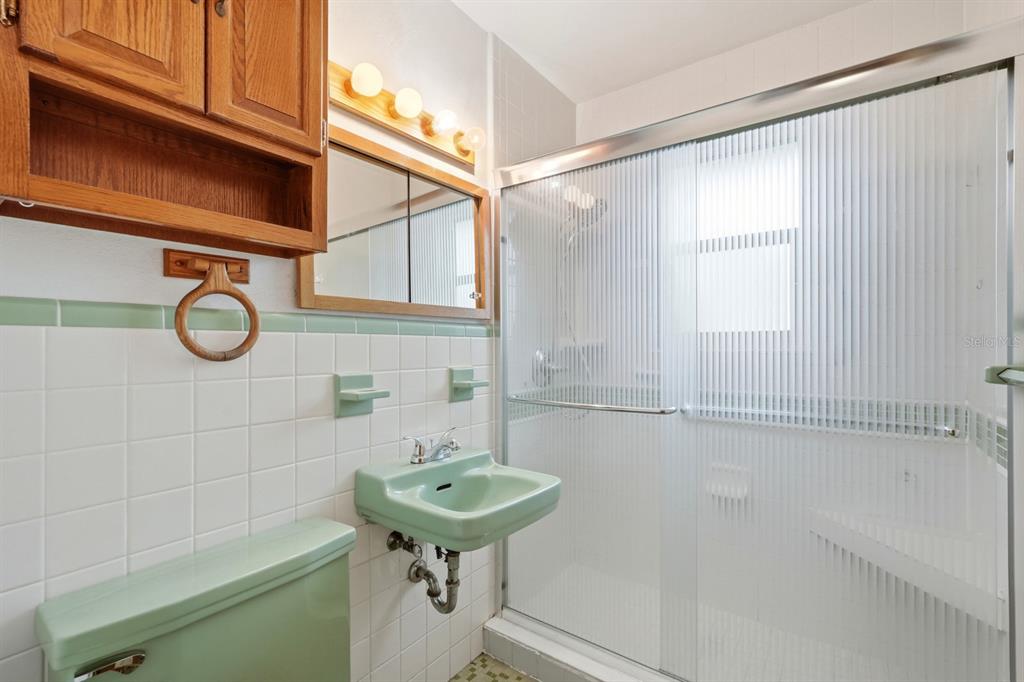 37 Berkley Road Ormond Beach, FL 32176 - Photo 22 of 41 a bathroom with a sink and a mirror