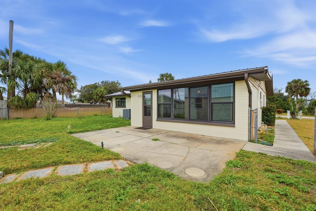 37 Berkley Road Ormond Beach, FL 32176 - Photo 25 of 41 front view of a house with a yard
