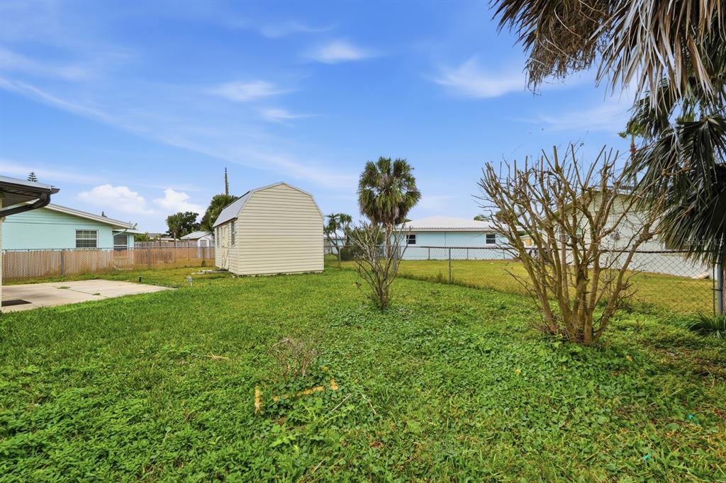 37 Berkley Road Ormond Beach, FL 32176 - Photo 26 of 41 a house view with a garden space