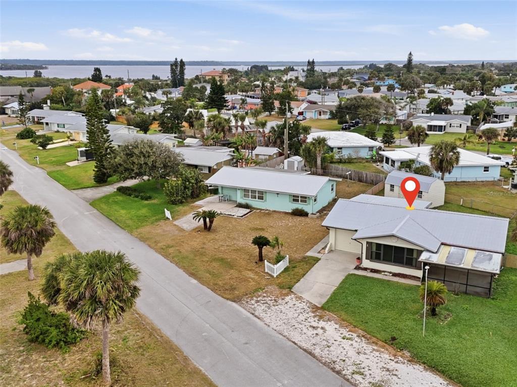 37 Berkley Road Ormond Beach, FL 32176 - Photo 34 of 41 an aerial view of a house with garden space and street view