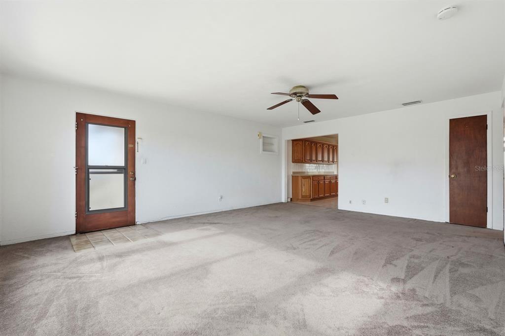 37 Berkley Road Ormond Beach, FL 32176 - Photo 9 of 41 a view of an empty room with a window
