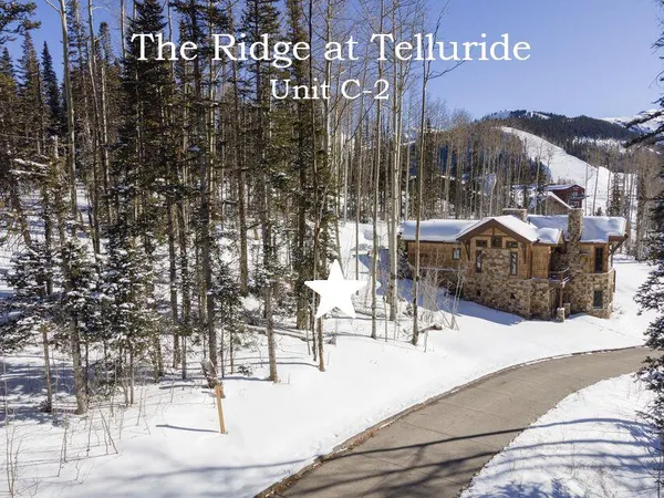 a view of tall buildings with a street