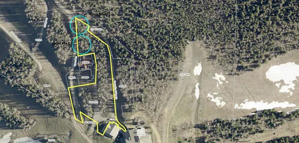 a terrace of a house with table and chairs