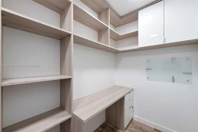 a room with storage and utility