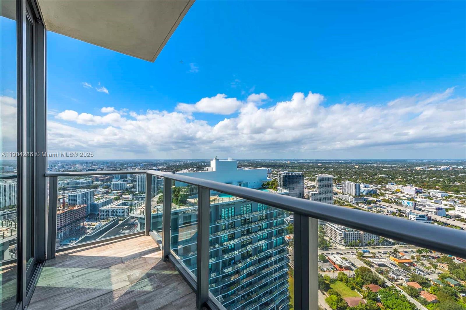 650 Northeast 32nd Street, Unit PH5201 Miami, FL 33137 - Photo 32 of 42 a view of city from a balcony