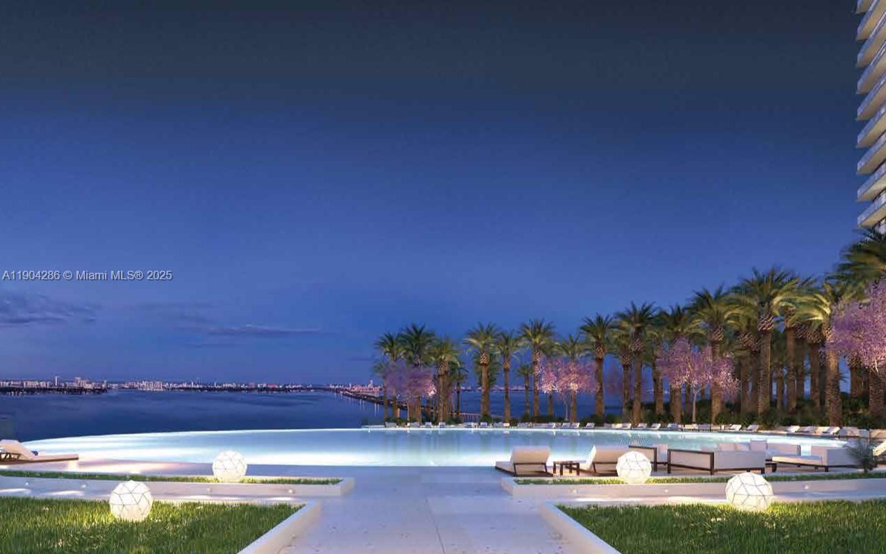 650 Northeast 32nd Street, Unit PH5201 Miami, FL 33137 - Photo 41 of 42 a view of swimming pool with outdoor seating and yard