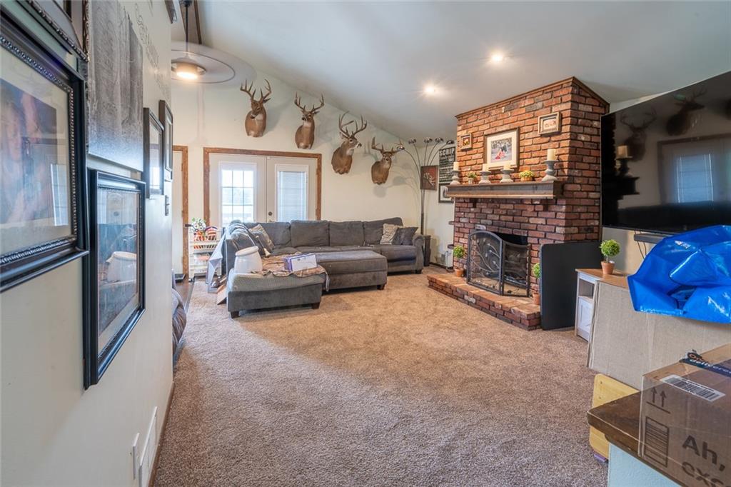 181 Hamtom Road Eighty Four, PA 15330 - Photo 12 of 42 a living room with furniture and a fireplace