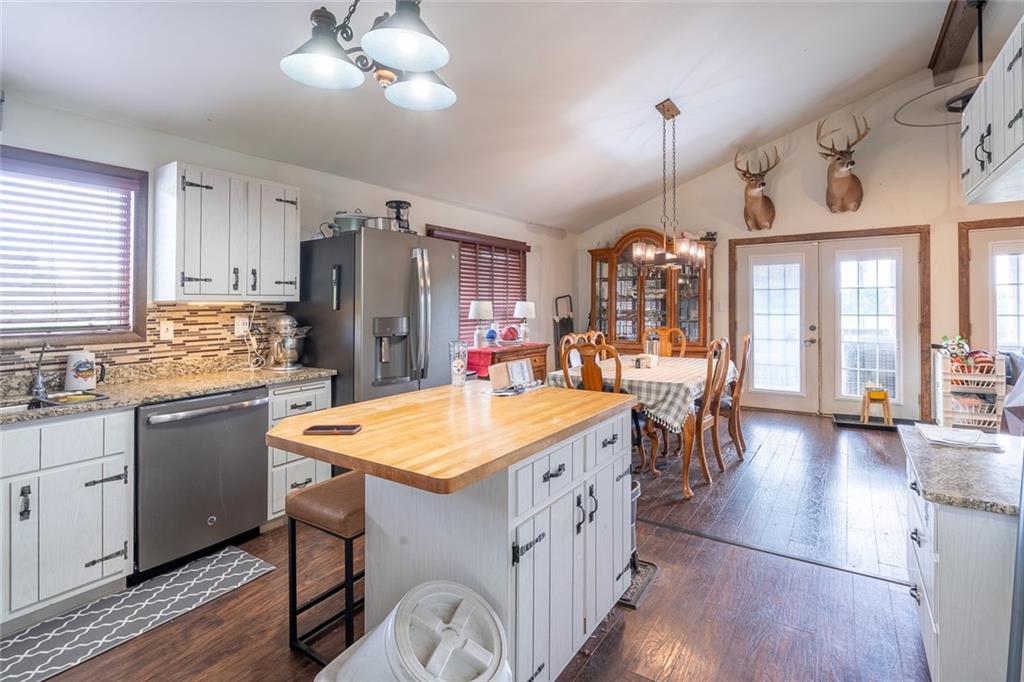 181 Hamtom Road Eighty Four, PA 15330 - Photo 16 of 42 a large kitchen with lots of counter space and chandelier