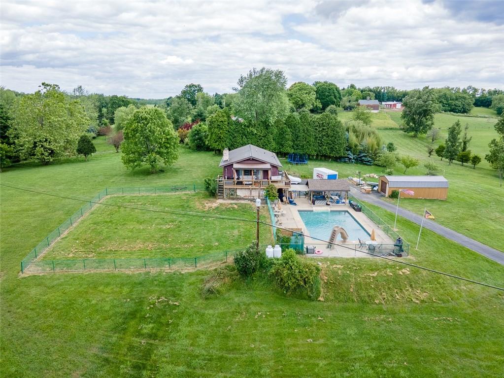 181 Hamtom Road Eighty Four, PA 15330 - Photo 5 of 42 a aerial view of a house with a big yard deck and large trees