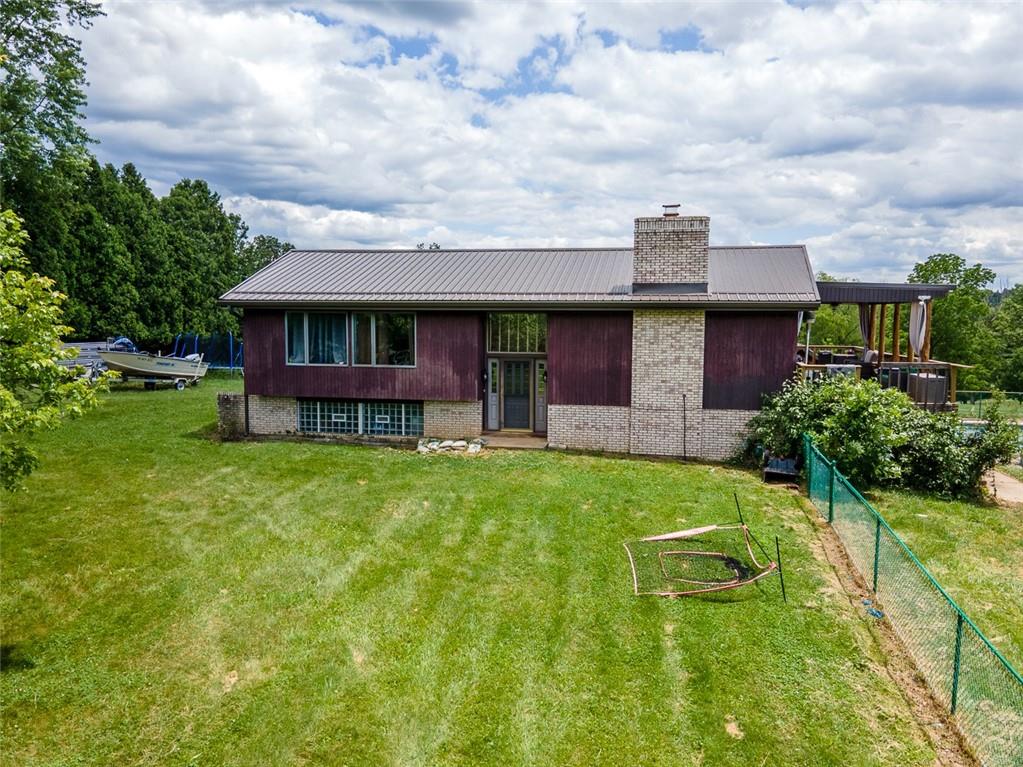 181 Hamtom Road Eighty Four, PA 15330 - Photo 8 of 42 a view of a house with backyard sitting area and garden