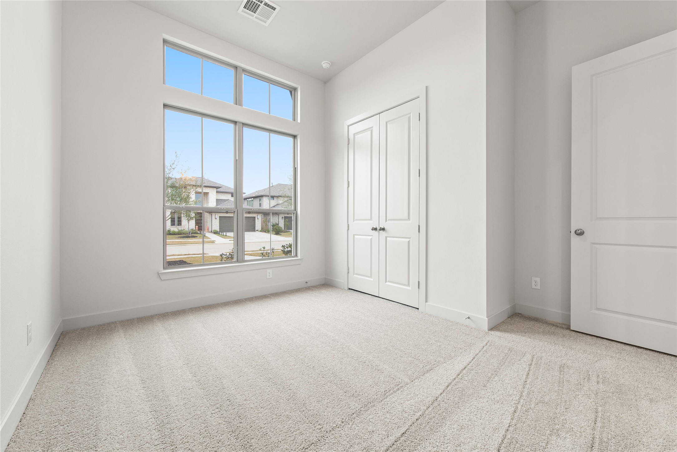 109 Meadow Beauty Lane Georgetown, TX 78633 - Photo 11 of 24 a view of an empty room with a window