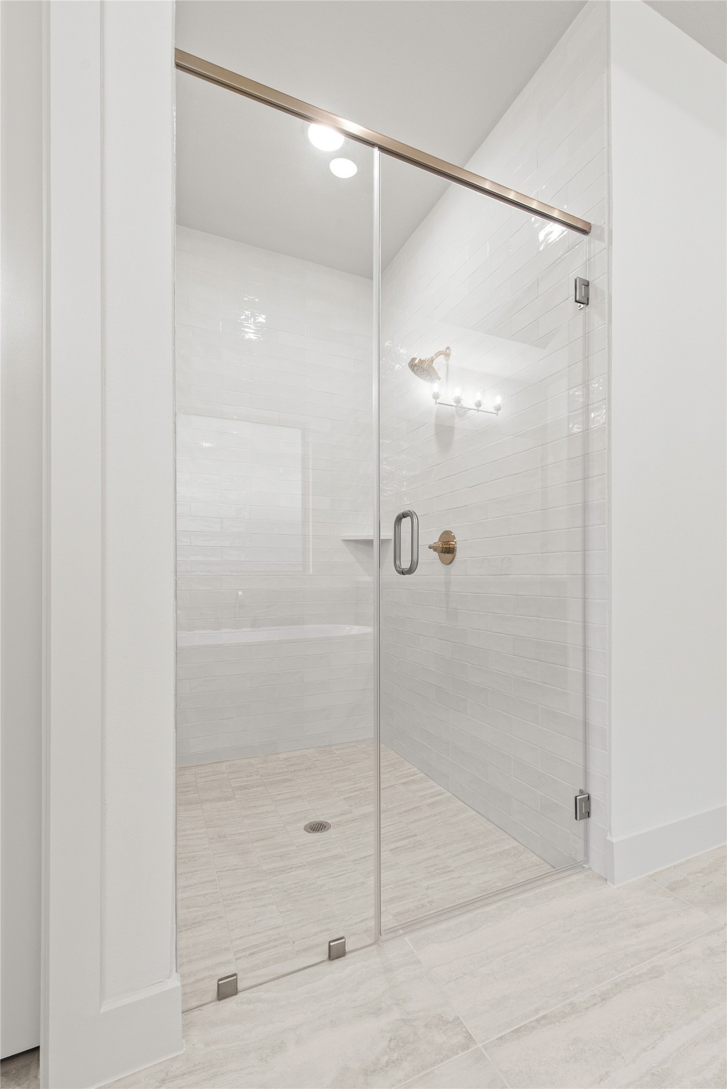 109 Meadow Beauty Lane Georgetown, TX 78633 - Photo 10 of 24 a bathroom with a glass shower door