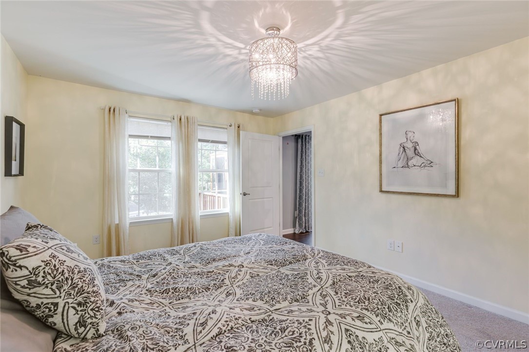 10331 Sandy Ridge Drive Chesterfield, VA 23832 - Photo 12 of 39 a bedroom with bed and a window