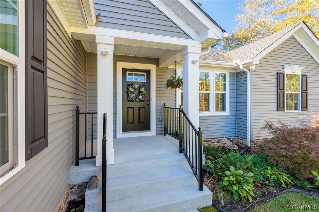 10331 Sandy Ridge Drive Chesterfield, VA 23832 - Photo 2 of 39 a view of a porch with wooden floor and stairs