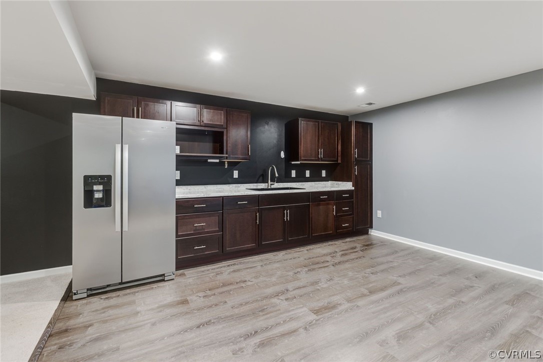 10331 Sandy Ridge Drive Chesterfield, VA 23832 - Photo 22 of 39 a kitchen with stainless steel appliances a sink a stove a refrigerator and cabinets