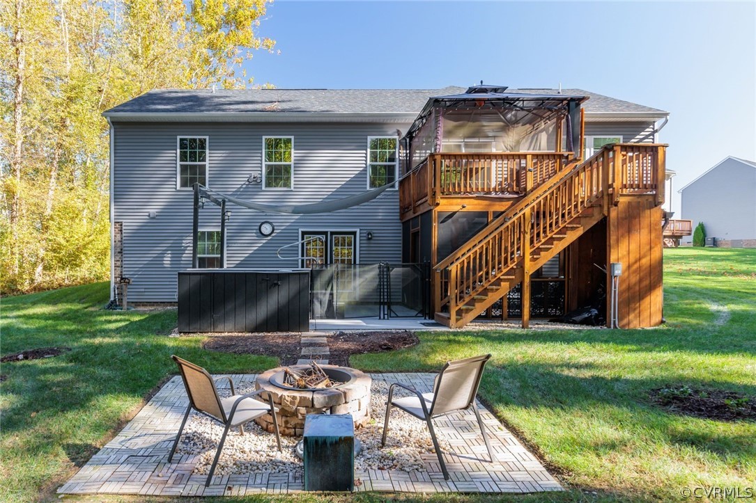 10331 Sandy Ridge Drive Chesterfield, VA 23832 - Photo 26 of 39 a view of house with a yard chairs and a table