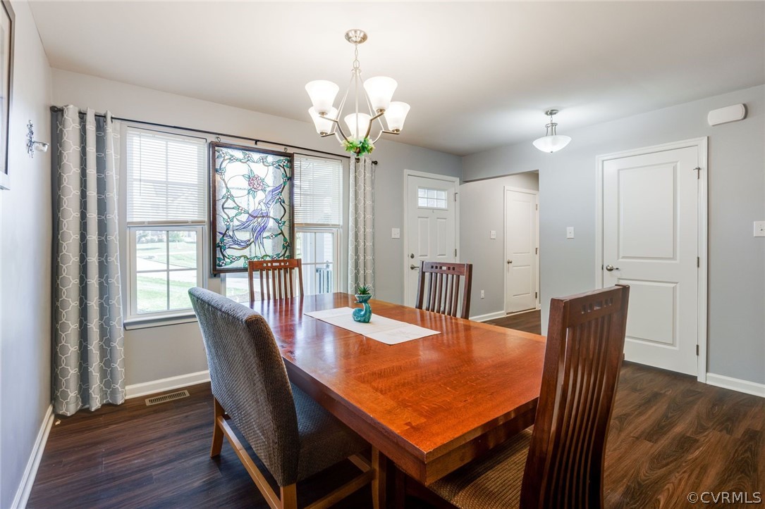 10331 Sandy Ridge Drive Chesterfield, VA 23832 - Photo 3 of 39 a view of a dining room with furniture window and wooden floor