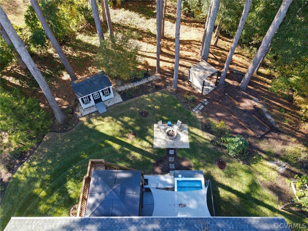 10331 Sandy Ridge Drive Chesterfield, VA 23832 - Photo 35 of 39 a view of a chairs and table in the backyard