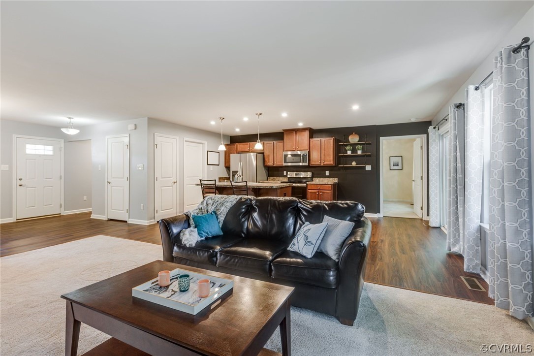 10331 Sandy Ridge Drive Chesterfield, VA 23832 - Photo 6 of 39 a living room with furniture and kitchen view