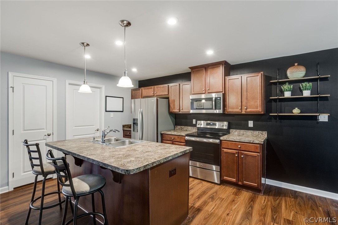 10331 Sandy Ridge Drive Chesterfield, VA 23832 - Photo 7 of 39 a kitchen with granite countertop a sink and cabinets