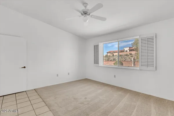 a bathroom with a glass door shower