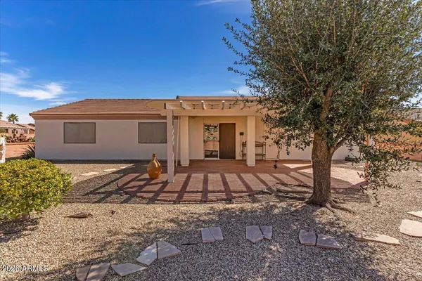 a view of an ocean and a mountain