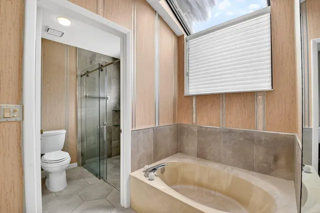 a view of a hallway with a chandelier