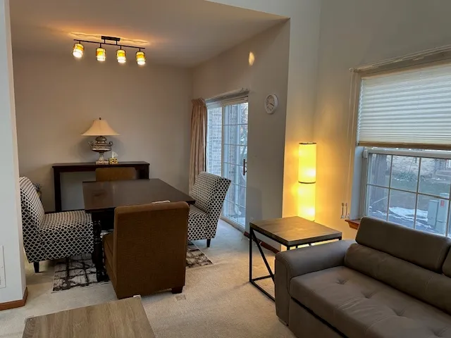 a bathroom with a sink a toilet a mirror and vanity