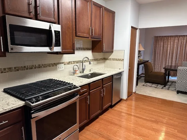 an empty room with a empty space and windows