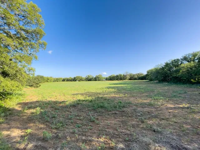 a view of an ocean and a mountain