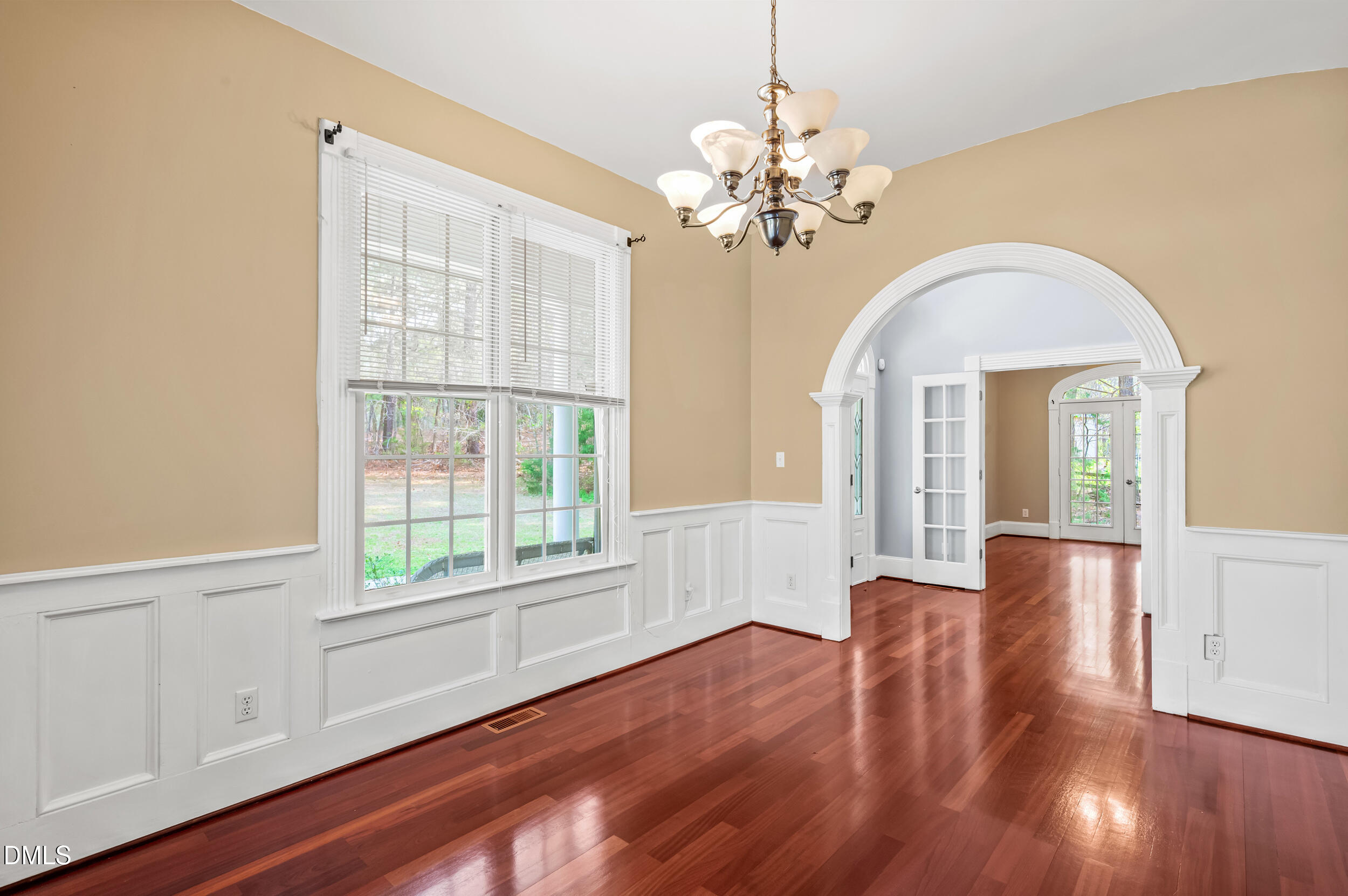 1957 Hilltop Road Raleigh, NC 27610 - Photo 6 of 46 a view of a livingroom with furniture wooden floor chandelier