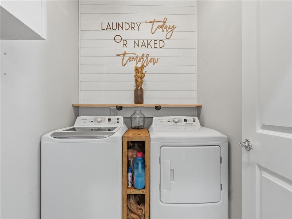 147 Fieldbrook Crossing Canton, GA 30115 - Photo 13 of 46 a utility room with dryer and washer