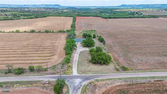 a view of a lake from a yard