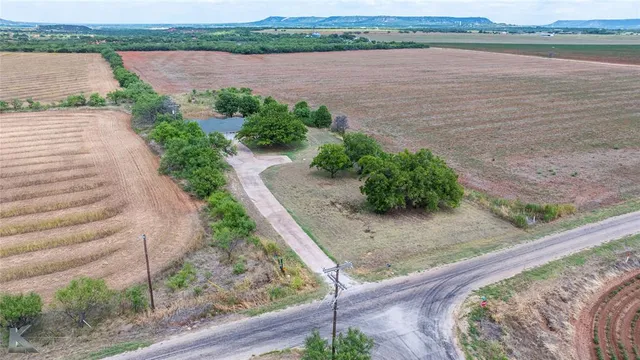 a view of a lake with houses with outdoor space