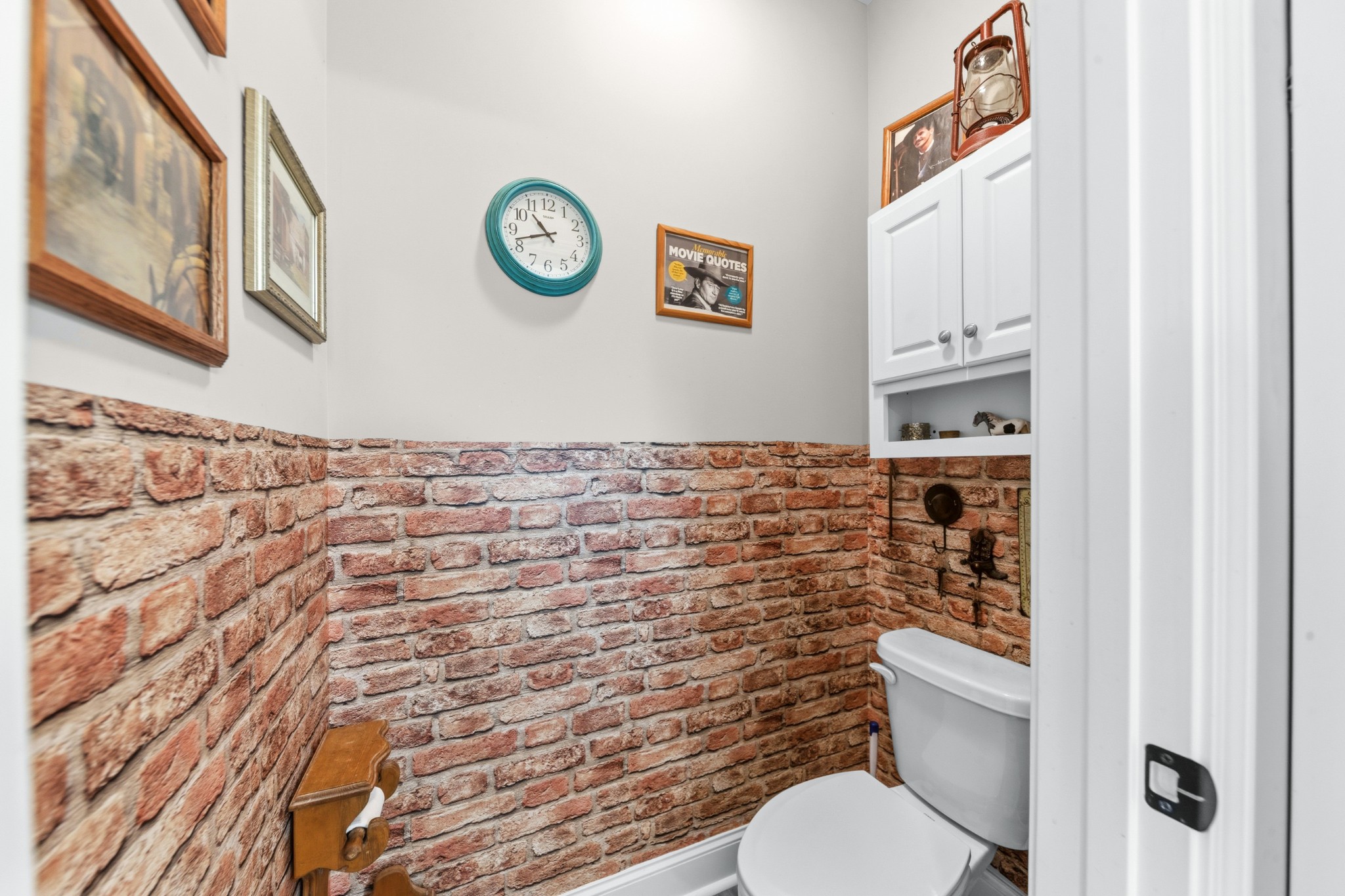 1224 Market Street Prospect, TN 38477 - Photo 35 of 80 a bathroom with a toilet and a shower curtain