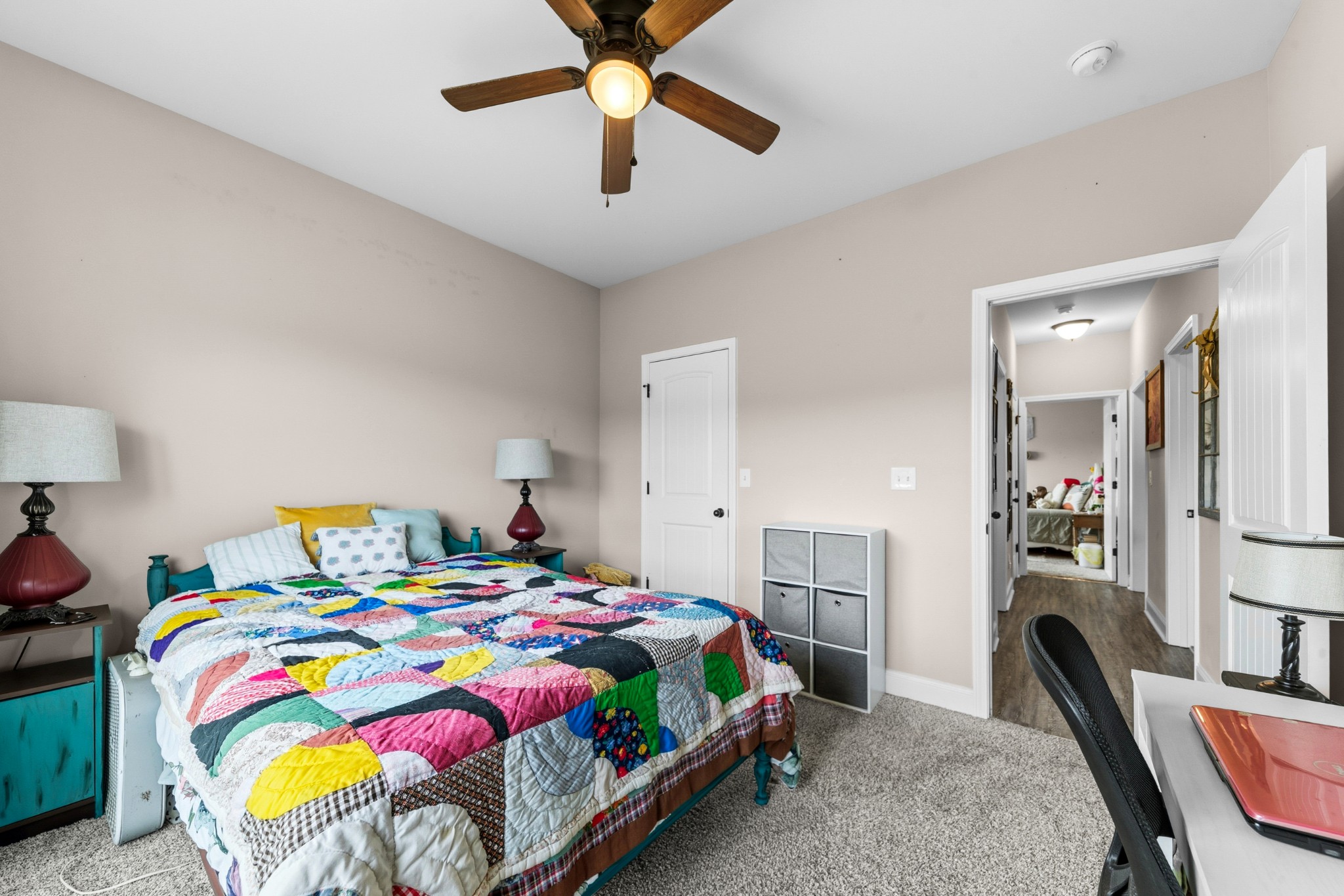 1224 Market Street Prospect, TN 38477 - Photo 42 of 80 a bedroom that has a bed and a chandelier