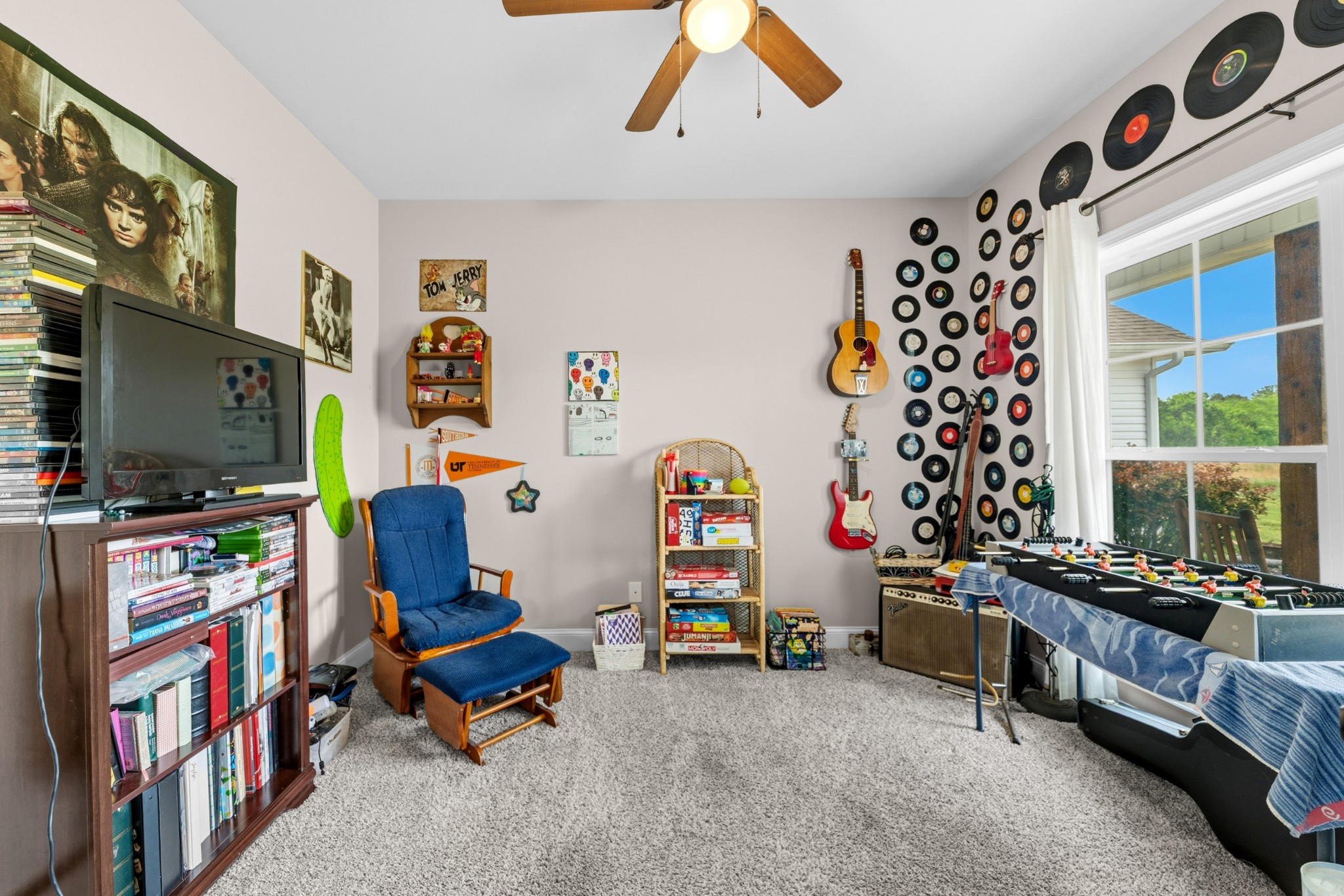 1224 Market Street Prospect, TN 38477 - Photo 48 of 80 a children room with toys and a flat screen tv