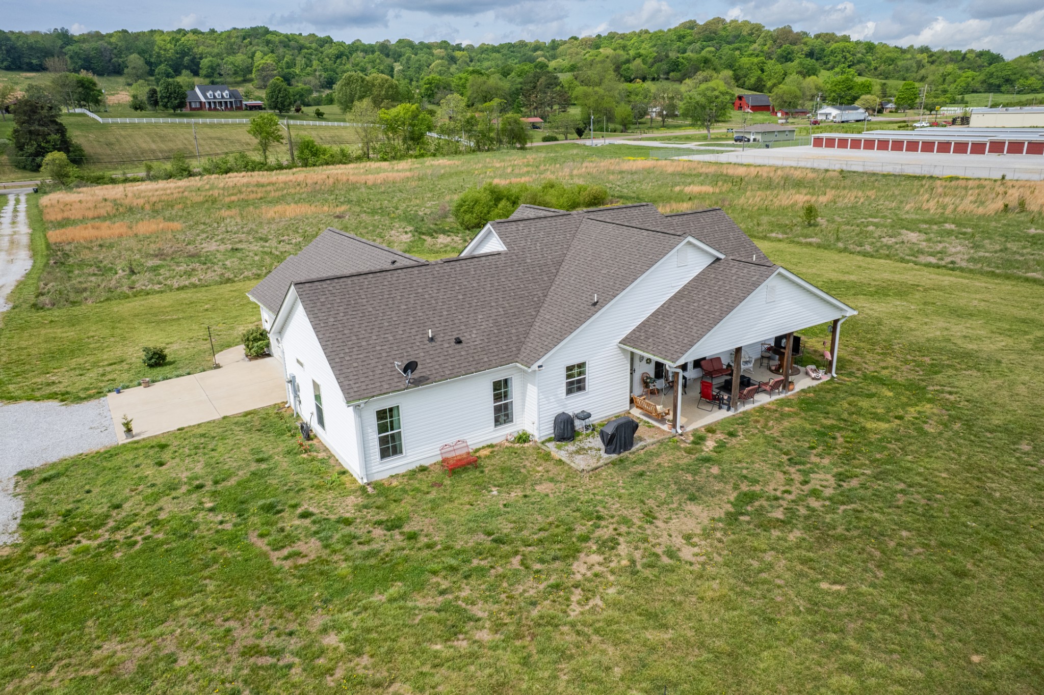1224 Market Street Prospect, TN 38477 - Photo 10 of 80 a aerial view of a house with a yard and lake view