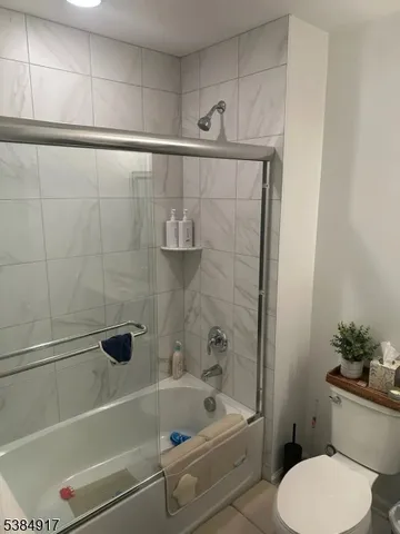 a bathroom with a sink a toilet and a bathtub